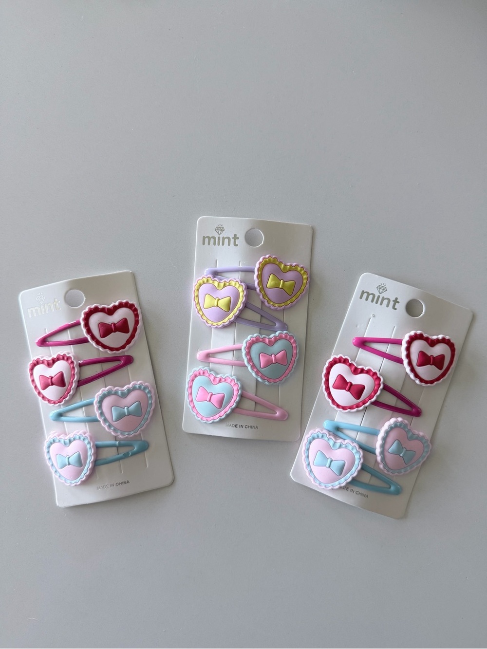 Mint Heart Bow Snap Clip Trio – Pink, Blue & Red Accents